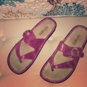 Alegria sandals with orthotic sole technology.